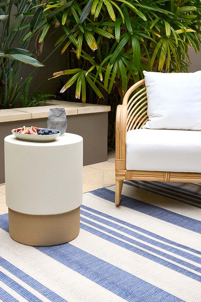 Ariel Blue outdoor rug – coastal striped flatweave design in blue and ivory, perfect for patios, decks, and indoor-outdoor spaces.