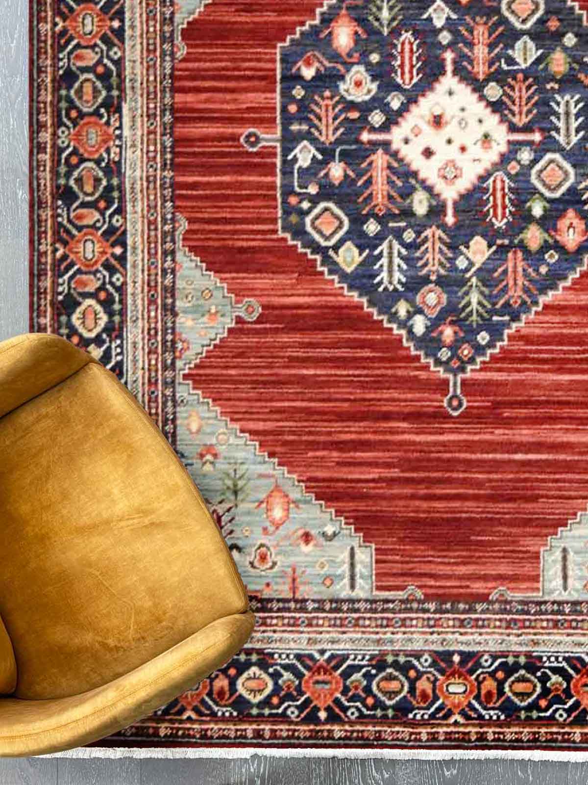Walter Bazaar Spice rug – red traditional wool rug with navy medallion. Available at Rugs N Timber in Belrose