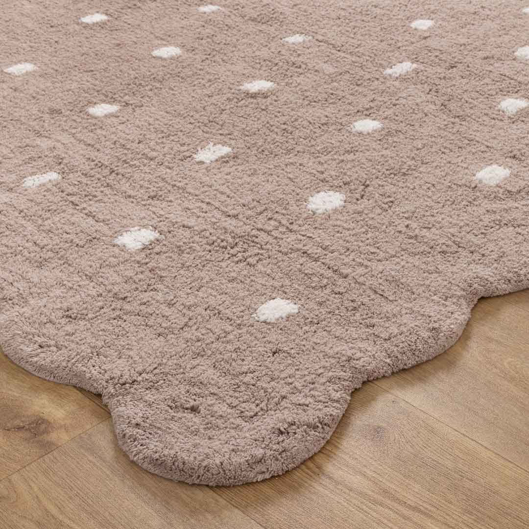 Como Mushroom rug – soft cotton kids rug in warm taupe with scalloped edge and dotted pattern, perfect for bedrooms and nurseries. Available at Rugs N Timber Belrose
