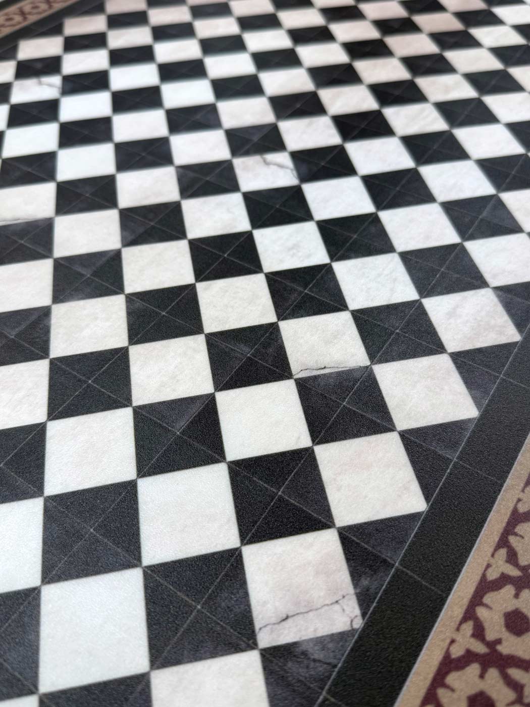 Beija Flor Damka geometric black and white vinyl mat for entryway or kitchen