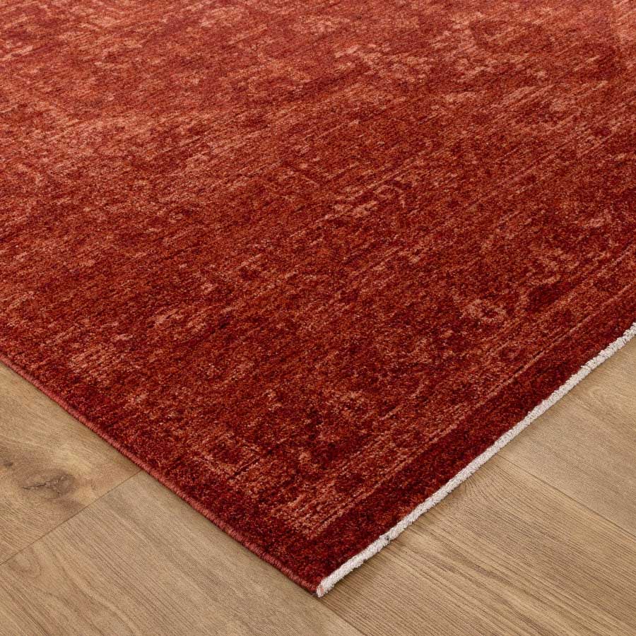 Close-up of Vienna Château Rust Rug corner showing detailed texture and soft polyester pile – visit our Belrose rug store to feel the quality in person