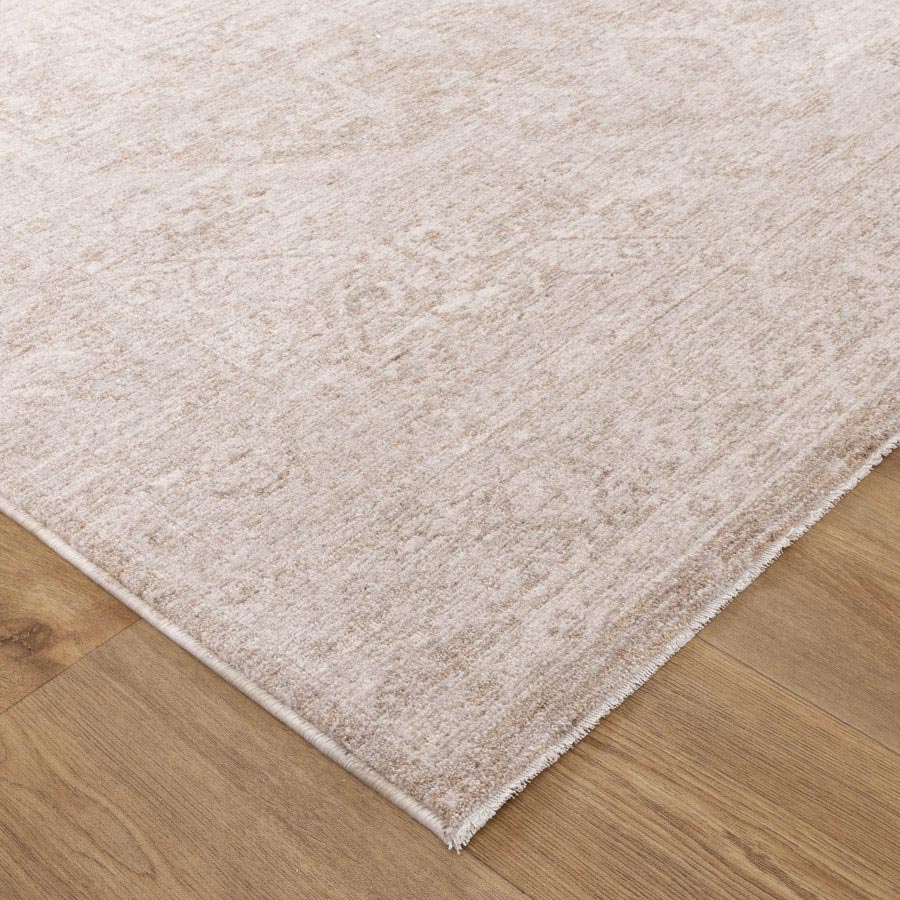 Close-up of Vienna Château Ivory Rug corner showing detailed texture and soft polyester pile – visit our Belrose rug store to feel the quality in person