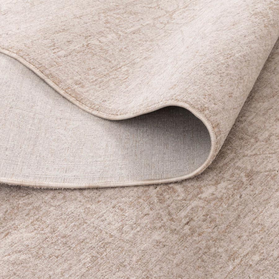 Vienna Château Ivory Rug showing non-shedding backing and flexible fold, power-loomed for durability – see this rug in-store at Rugs N Timber Belrose.
