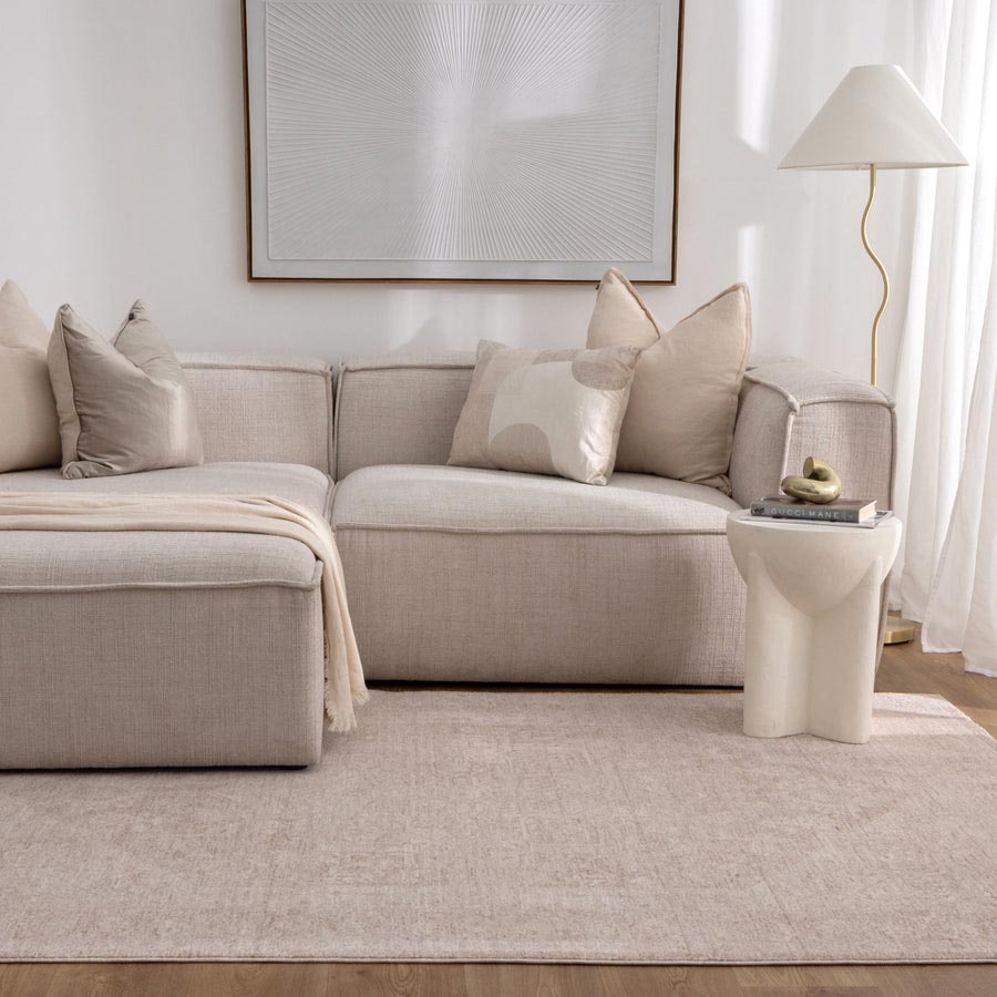 Vienna Château Ivory Rug styled in modern living room with neutral sofa and soft lighting – view this design at our Belrose showroom, Northern Beaches.