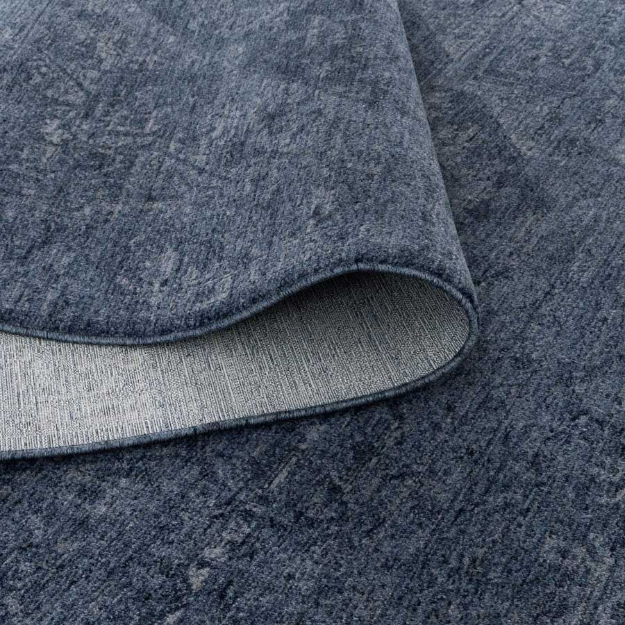 Vienna Château Denim Rug showing non-shedding backing and flexible fold, power-loomed for durability – see this rug in-store at Rugs N Timber Belrose.