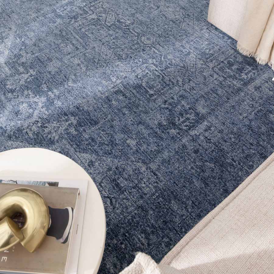 Denim blue tones of the Vienna Château Rug adding richness and texture to a contemporary home – available now at Rugs N Timber Belrose Sydney.