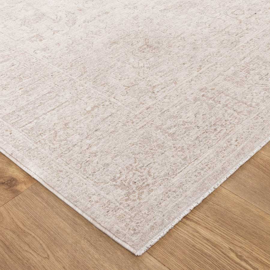Close-up of Vienna Manor Ivory Rug corner showing detailed texture and soft polyester pile – visit our Belrose rug store to feel the quality in person