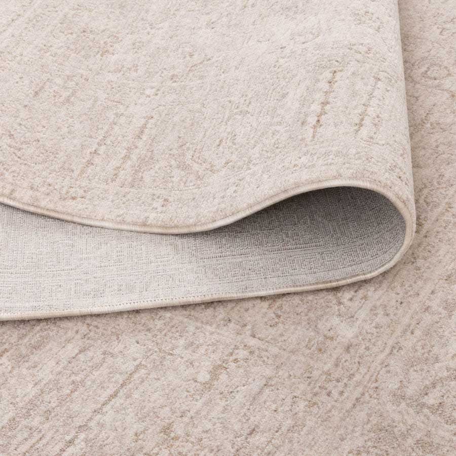 Vienna Manor Ivory Rug showing non-shedding backing and flexible fold, power-loomed for durability – see this rug in-store at Rugs N Timber Belrose.