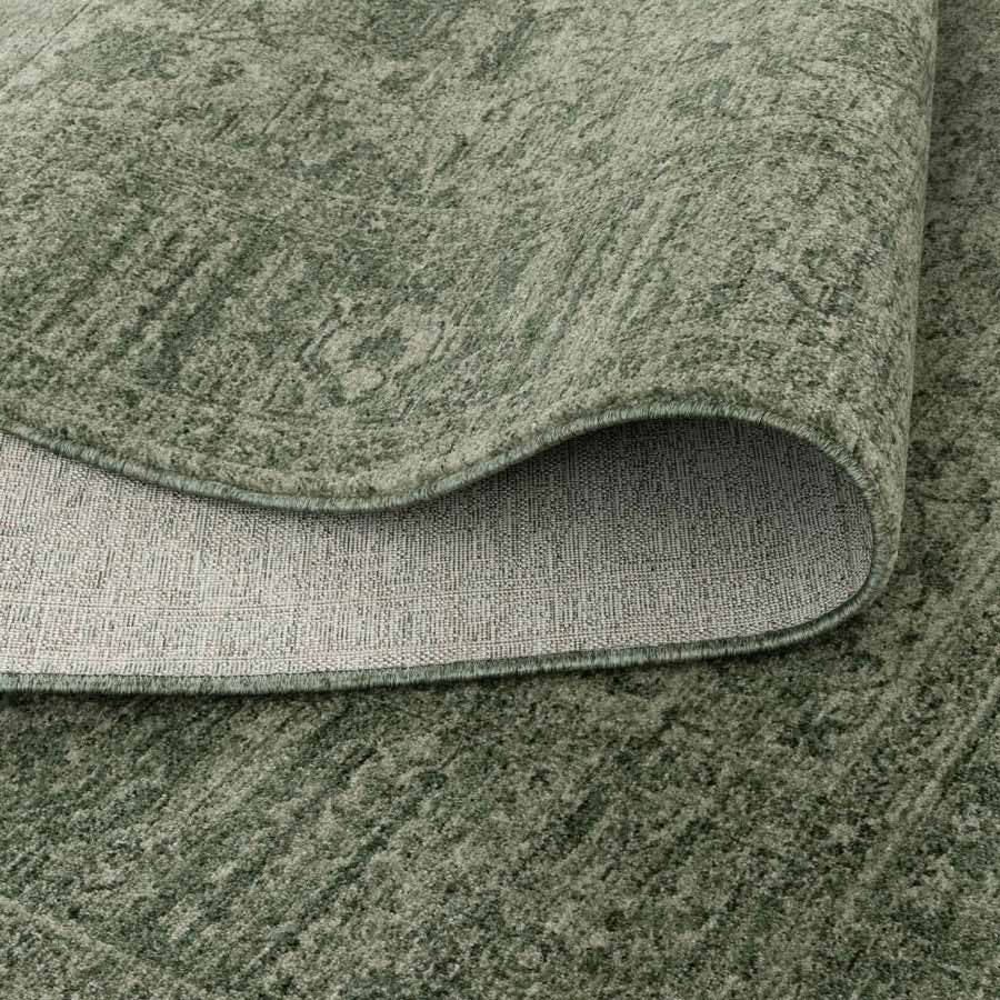 Vienna Manor Sage Rug showing non-shedding backing and flexible fold, power-loomed for durability – see this rug in-store at Rugs N Timber Belrose.