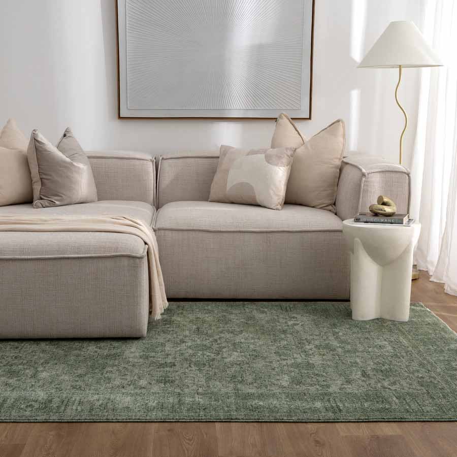 Vienna Manor Sage Rug styled in modern living room with neutral sofa and soft lighting – view this design at our Belrose showroom, Northern Beaches.