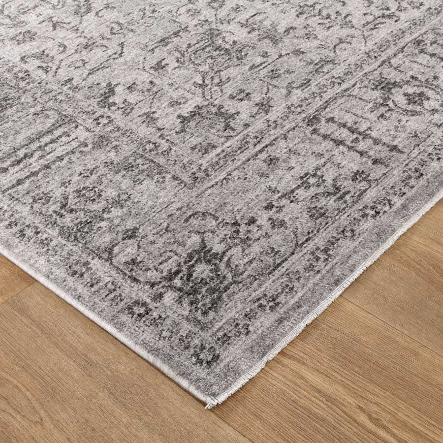 Close-up of Vienna Manor Stone Rug corner showing detailed texture and soft polyester pile – visit our Belrose rug store to feel the quality in person