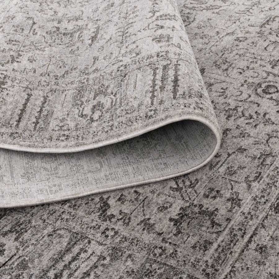 Vienna Manor Stone Rug showing non-shedding backing and flexible fold, power-loomed for durability – see this rug in-store at Rugs N Timber Belrose.