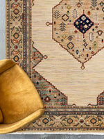 Walter Bazaar Sand rug – traditional wool rug with beige base, intricate medallion design and multicoloured border detailing. Available at Rugs N Timber Belrose