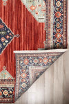 Walter Bazaar Spice rug – red traditional wool rug with navy medallion. Available at Rugs N Timber in Belrose