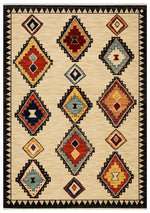 Walter Nomad Sand rug – tribal wool rug with cream base and colourful geometric diamond patterns, inspired by traditional design. Available at Rugs N Timber Belrose