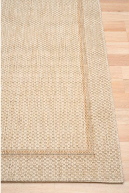 Alfred Border Linen indoor outdoor rug with subtle framed edge, available at Rugs N Timber Belrose showroom