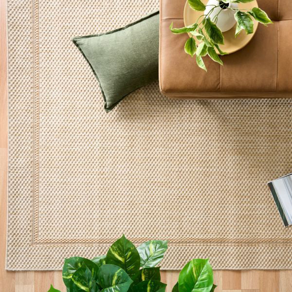 Alfred Border Linen indoor outdoor rug with subtle framed edge, available at Rugs N Timber Belrose showroom