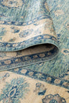 Azure Garden Afghan wool rug — teal field with floral medallions and cream border — handmade, natural dyes