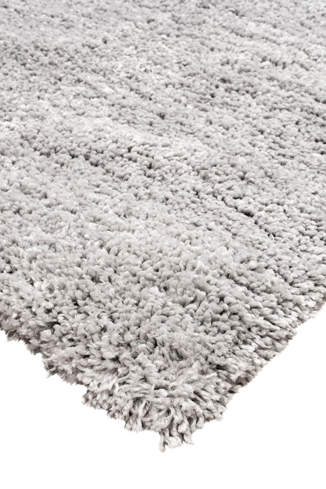 Close up of corner of Barrenjoey Silver shaggy rug with plush 45mm pile, available at Rugs N Timber Belrose showroom