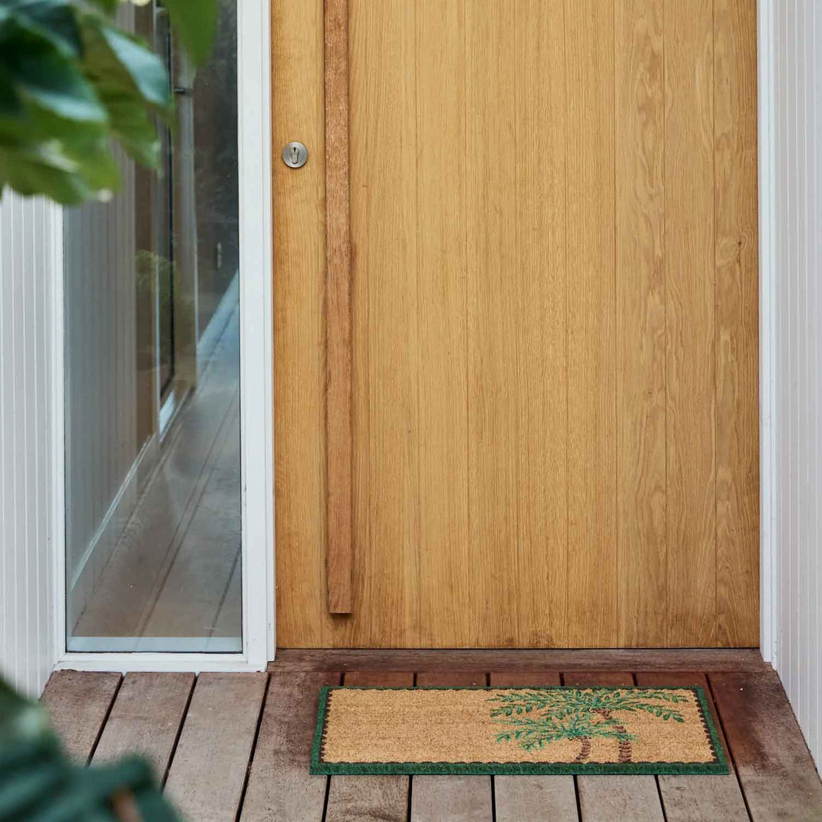 Bermuda palm tree coastal design natural coir doormat with PVC backing. Available at Rugs N Timber Belrose
