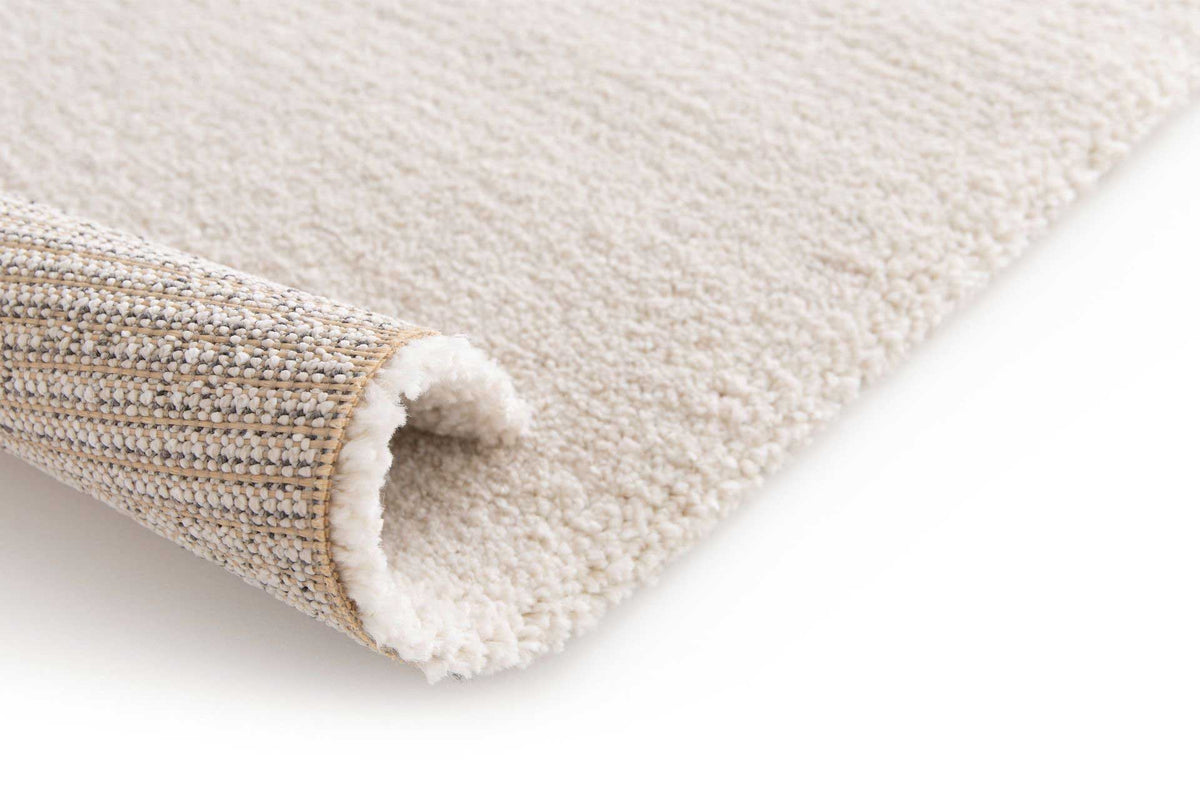 Cedric Ivory soft contemporary rug with plush 14mm pile. Available at Rugs N Timber Belrose.
