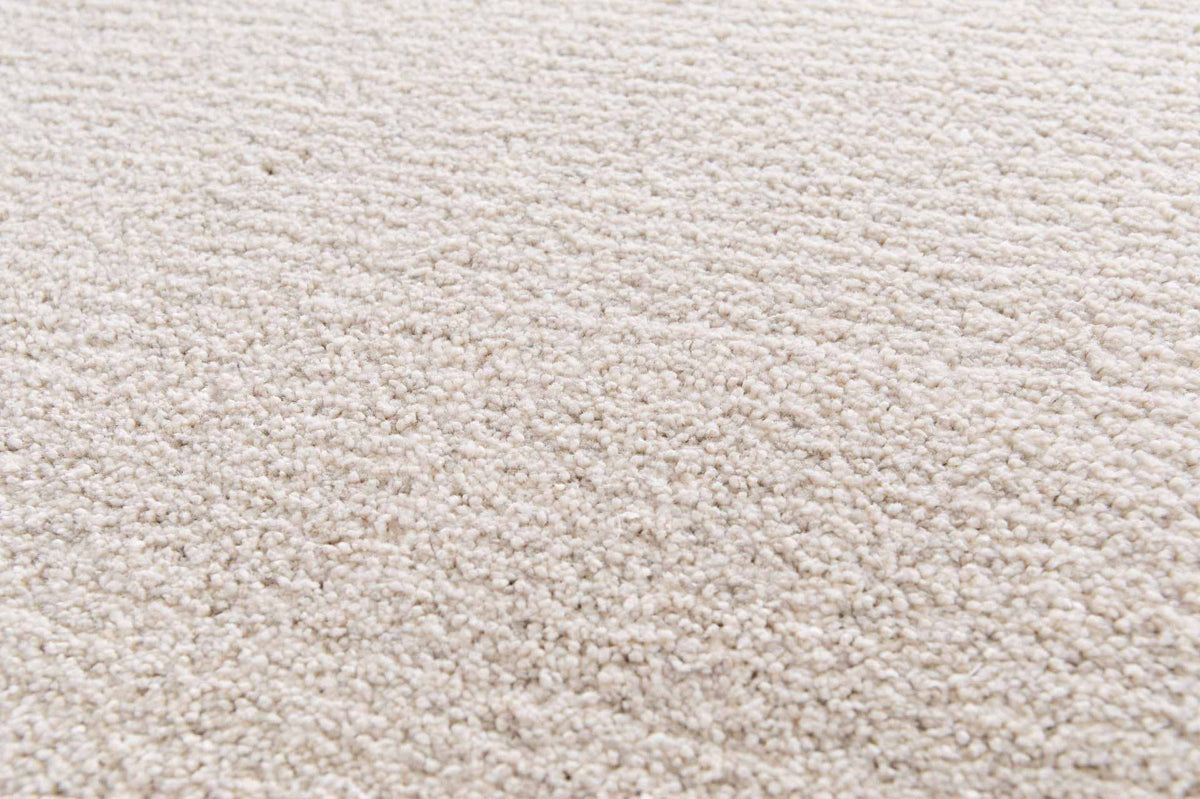 Cedric Pearl ivory rug with subtle silver highlights and soft plush pile. Available at Rugs N Timber Belrose.
