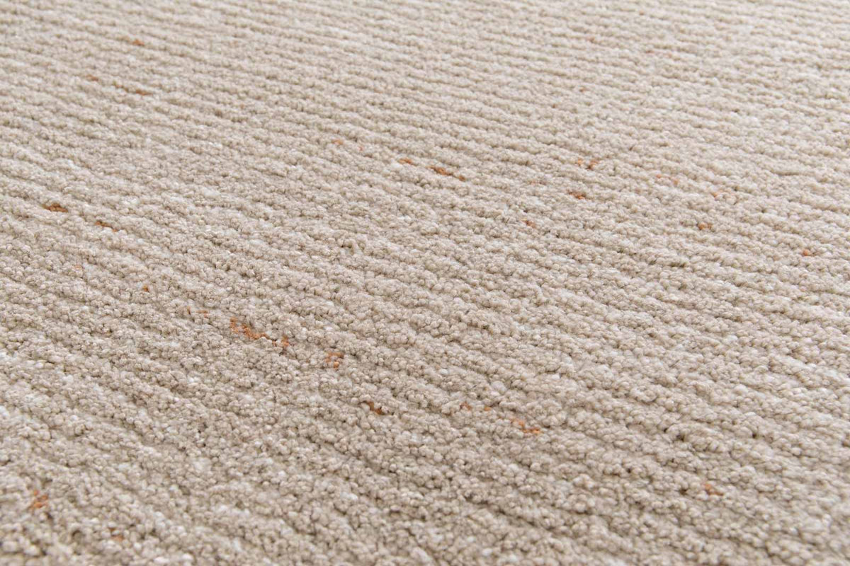 Cedric Sandstone beige rug with subtle caramel flecks and soft plush pile. Available at Rugs N Timber Belrose showroom