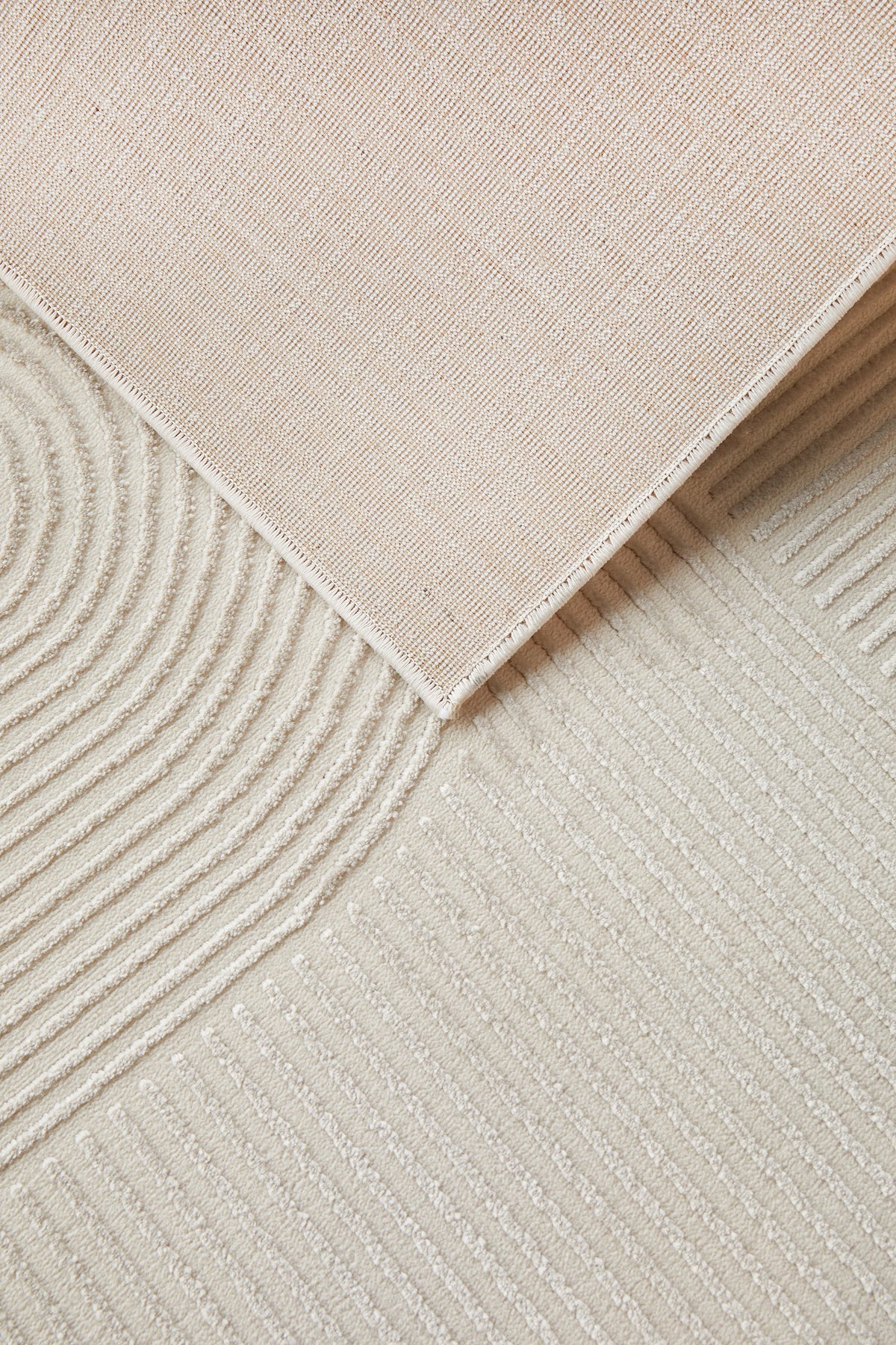 Colette Linen rug with soft arch pattern and neutral tones available at Rugs N Timber Belrose showroom