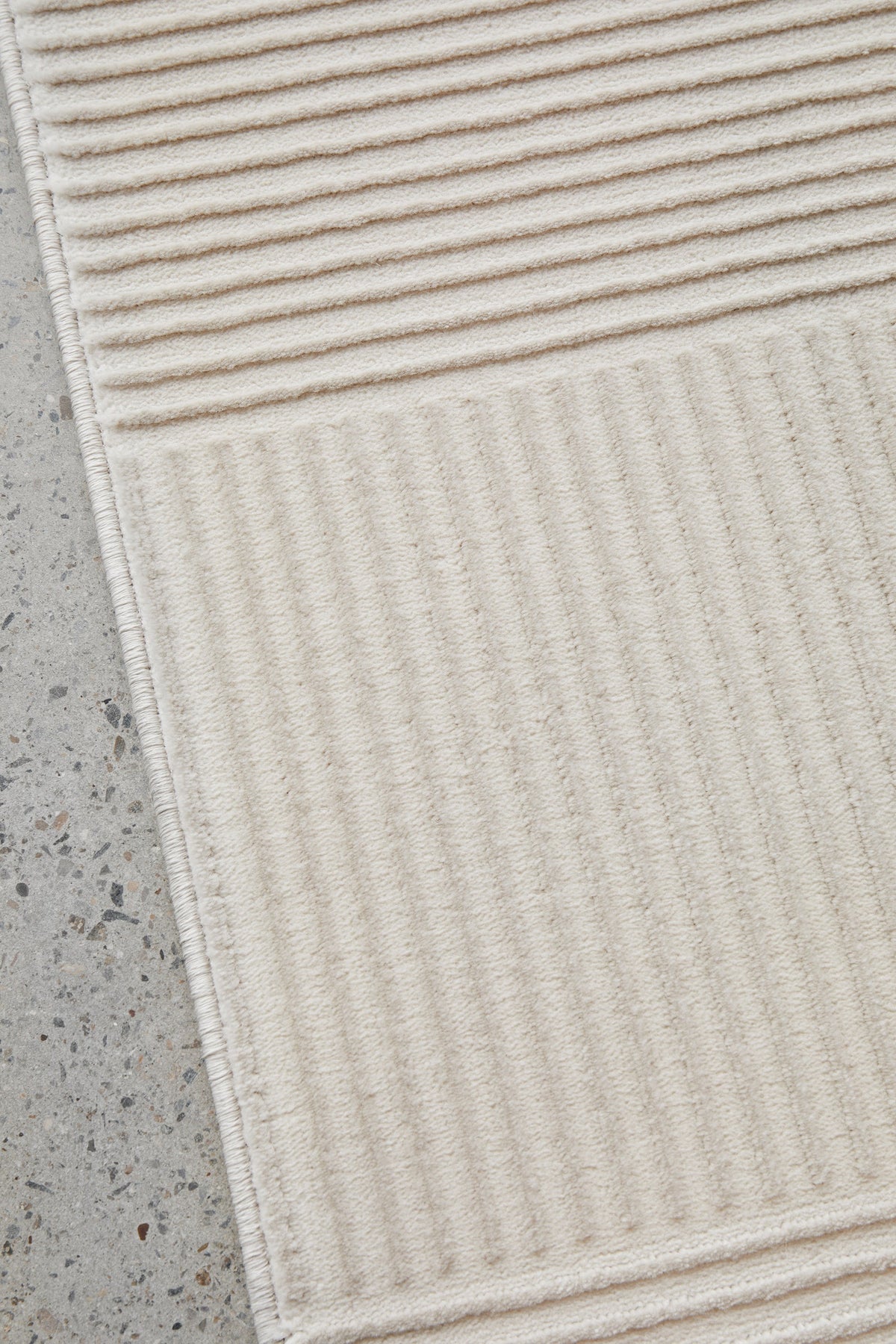 Colette Linen rug with soft arch pattern and neutral tones available at Rugs N Timber Belrose showroom