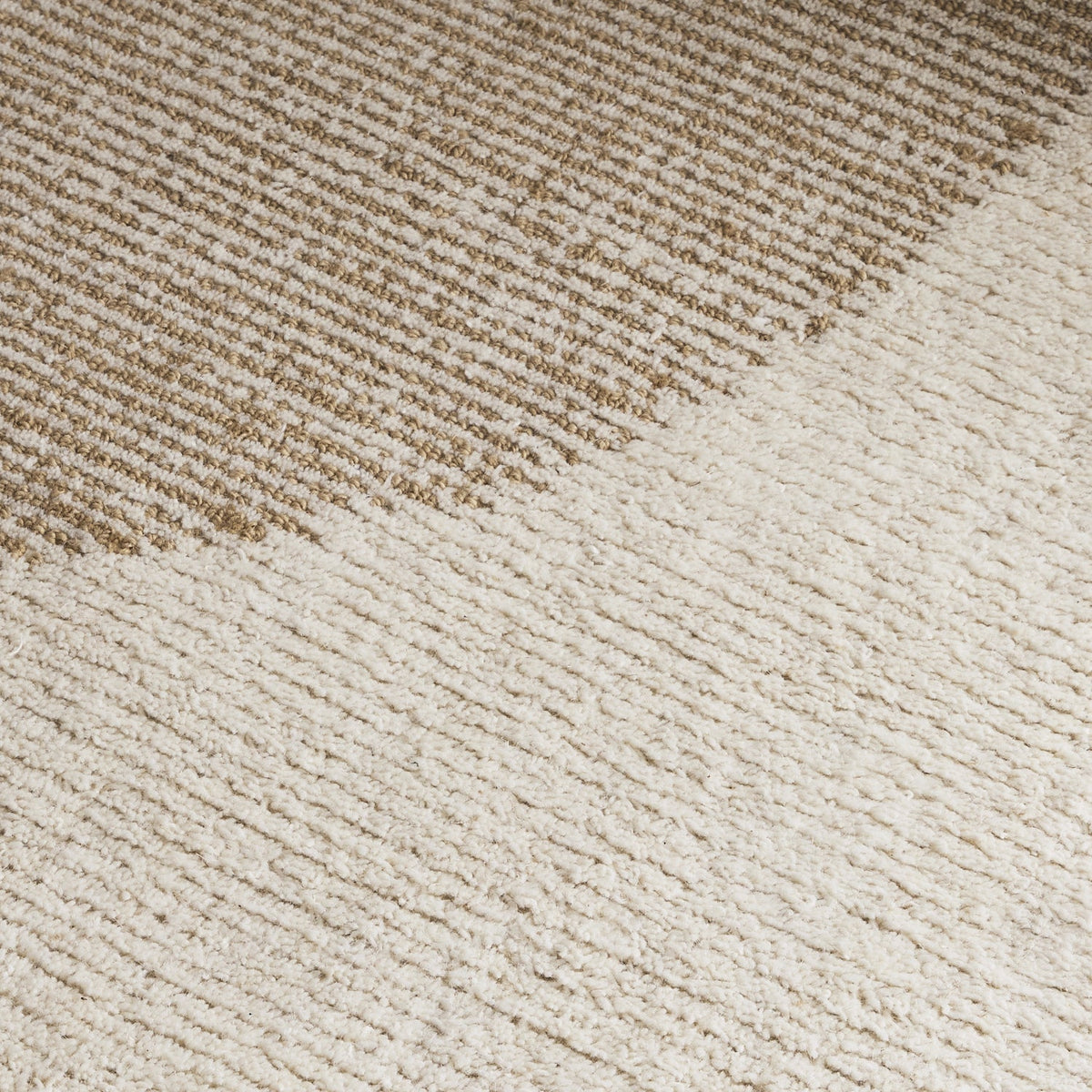Cove Stone wool rug with large abstract design in ivory, stone and warm neutral tones