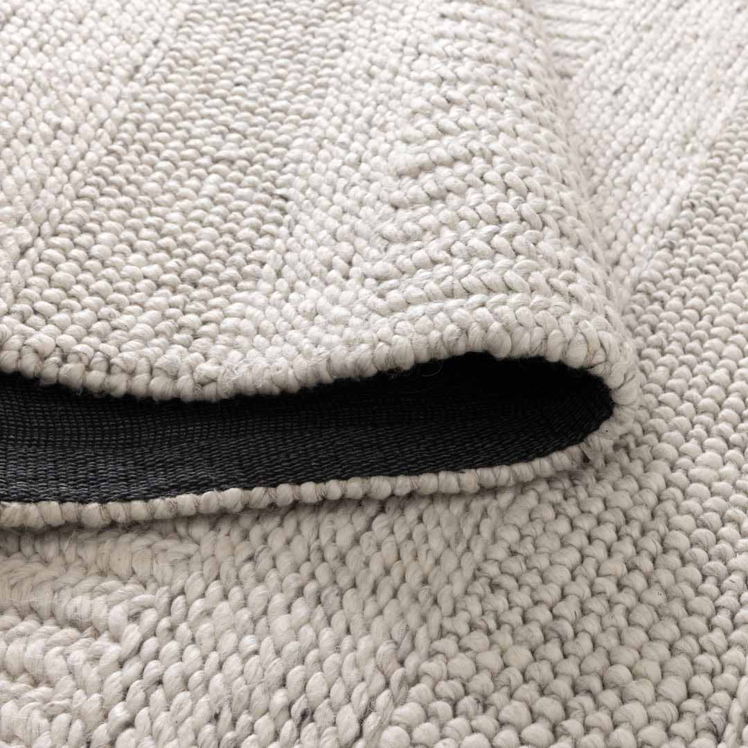Dakota Plateau Ivory handwoven New Zealand wool rug with textured weave available at Rugs N Timber Belrose showroom