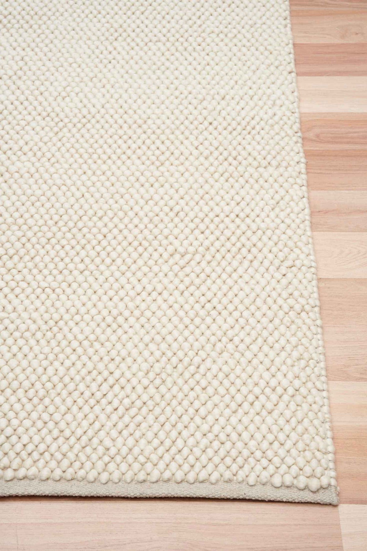 Eugene Crème Rug – handwoven wool blend loop-pile rug available at Rugs N Timber Belrose showroom