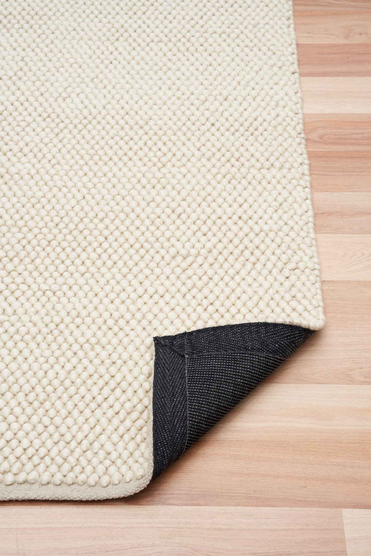 Eugene Crème Rug – handwoven wool blend loop-pile rug available at Rugs N Timber Belrose showroom