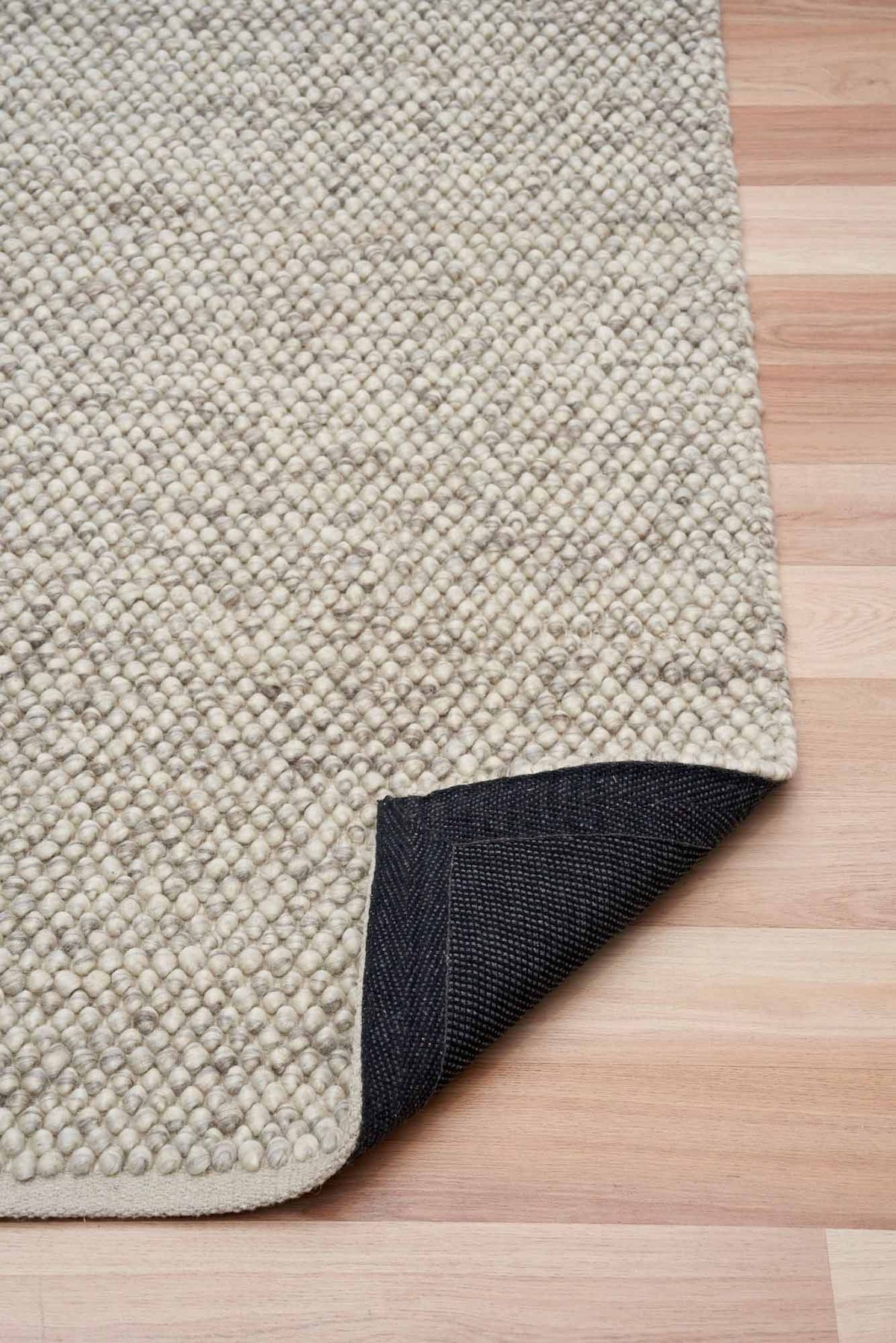 Eugene Fog Rug – light grey wool blend loop-pile rug available at Rugs N Timber Belrose showroom