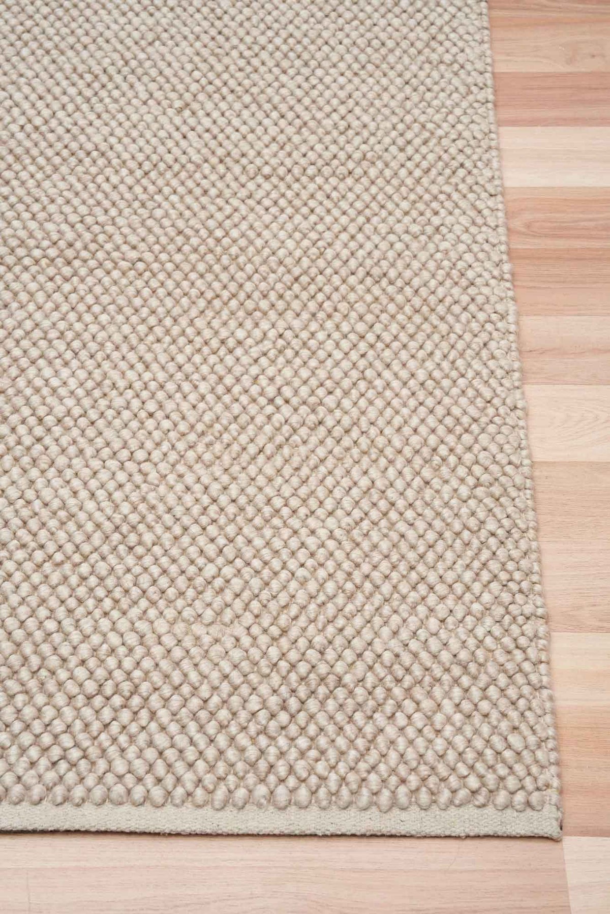 Eugene Sandstone Rug – natural wool blend loop-pile rug available at Rugs N Timber Belrose showroom