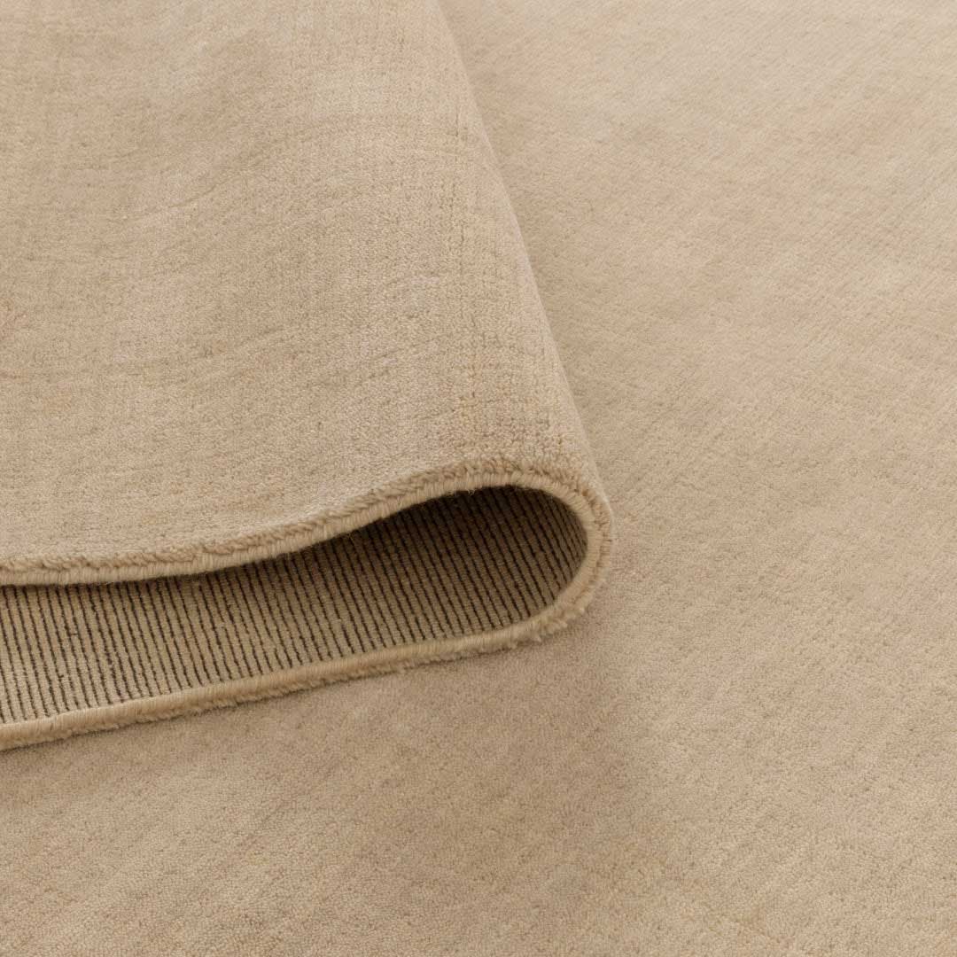 The Havana Almond rug offers soft neutral tones and luxurious hand knotted wool blend construction. See it in Belrose.