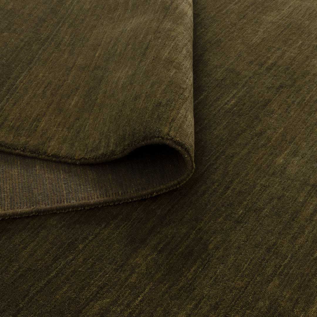 Havana Everglade hand knotted wool blend rug in rich olive green tones at Rugs N Timber Belrose