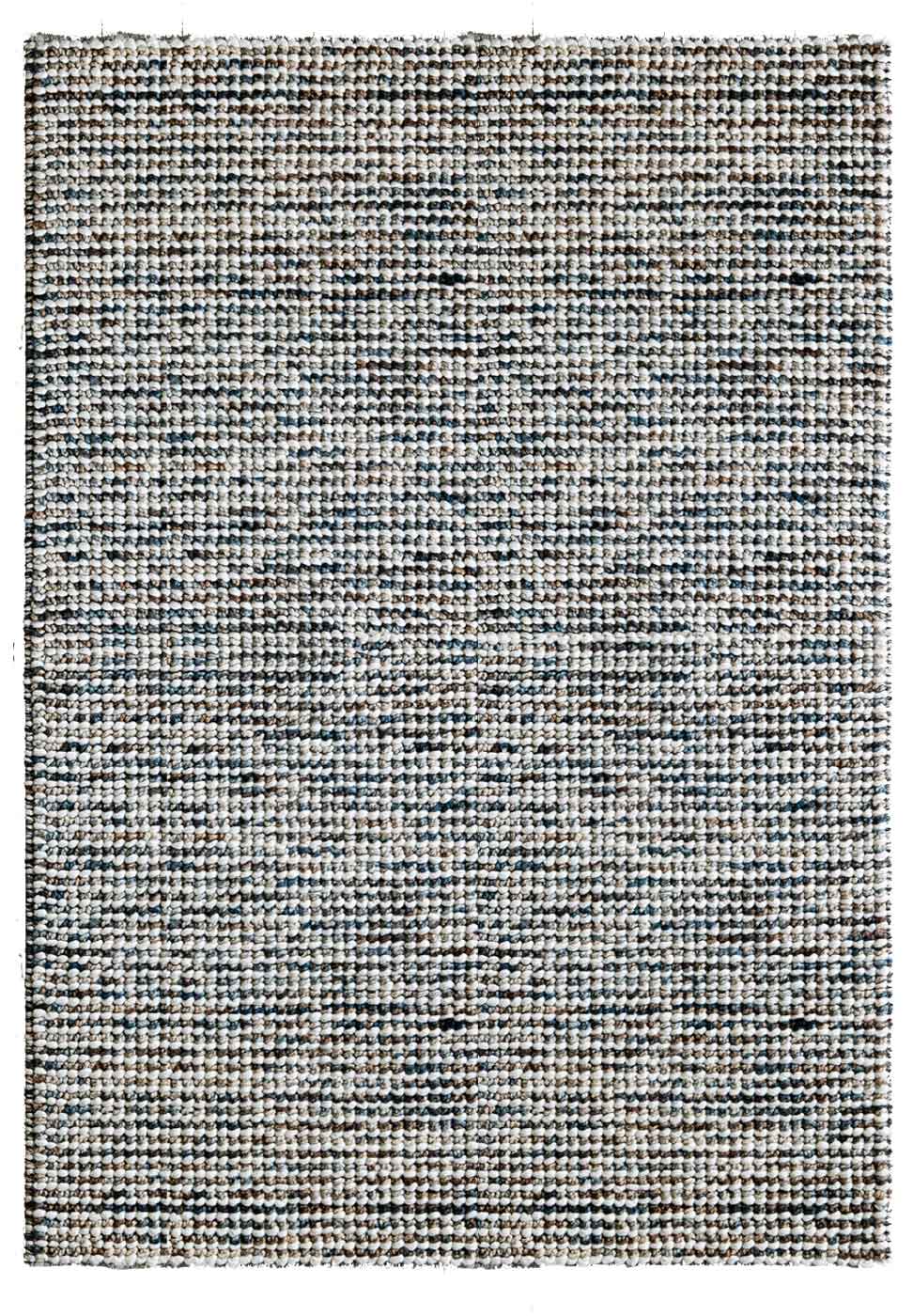 Jeffrey Peacock hand woven wool rug with textured loop pile in rich blue beige tones. Available in Belrose