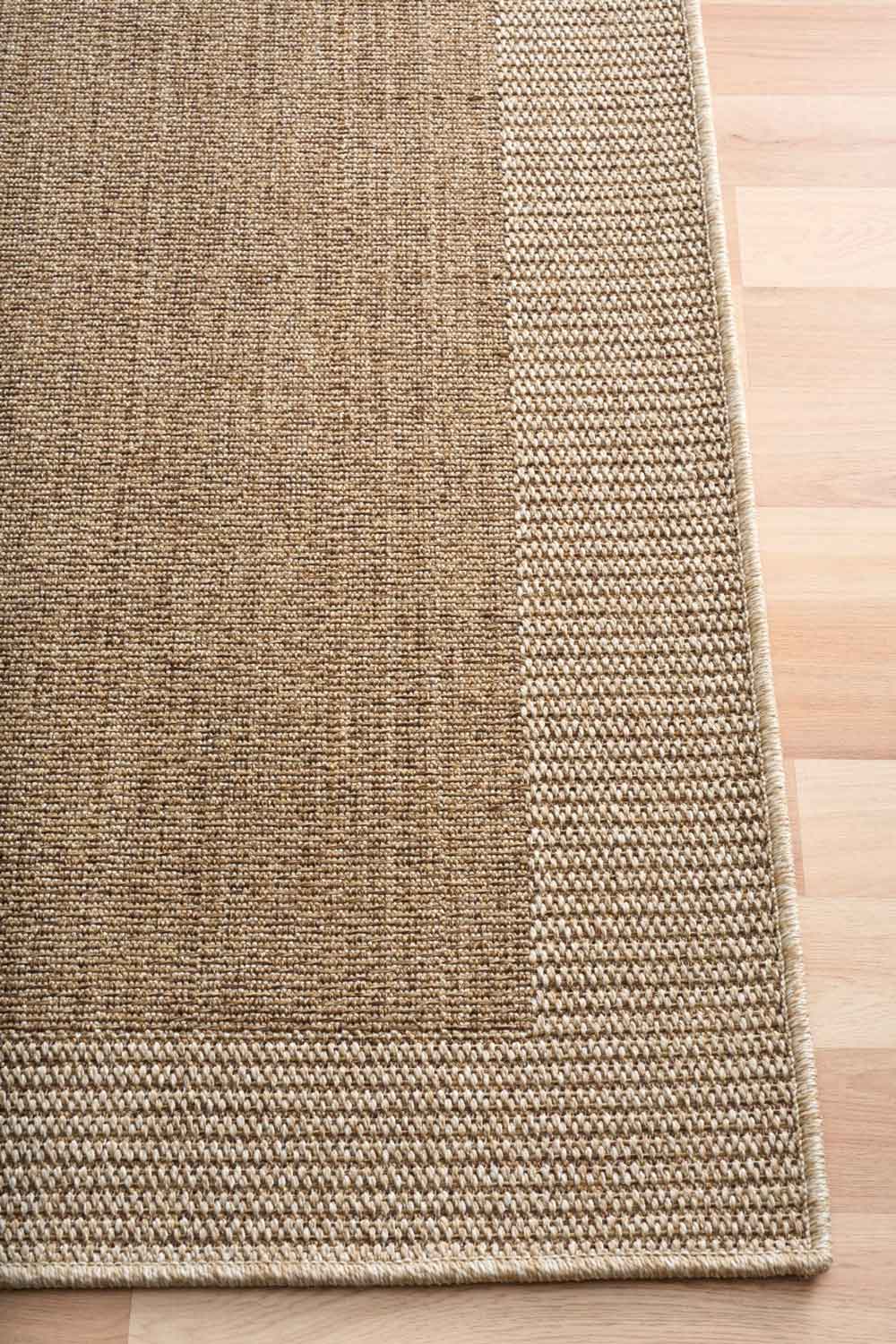Linden Border Natural indoor outdoor rug with a neutral centre and contrasting framed edge. Available at Rugs N Timber Belrose