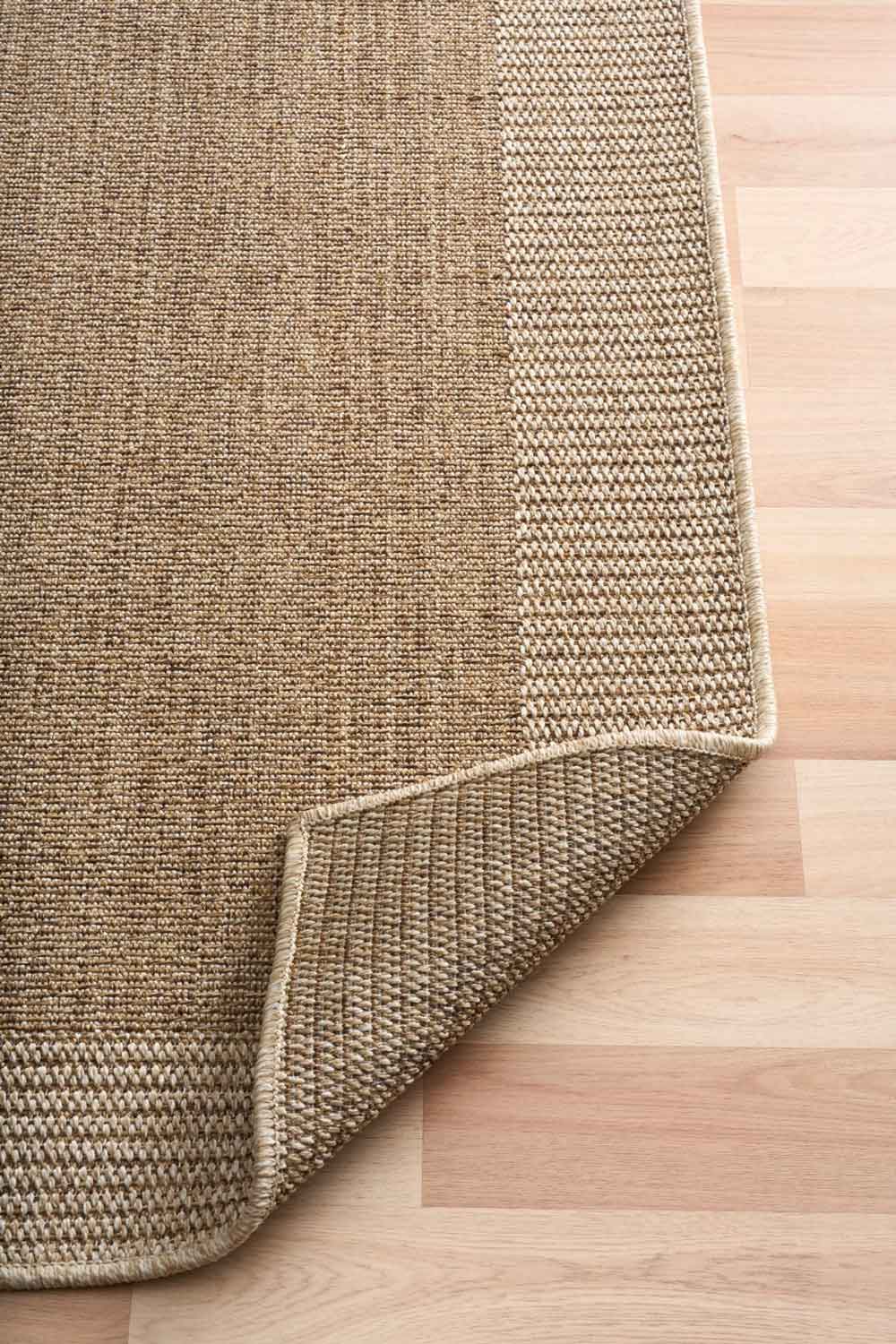 Linden Border Natural indoor outdoor rug with a neutral centre and contrasting framed edge. Available at Rugs N Timber Belrose