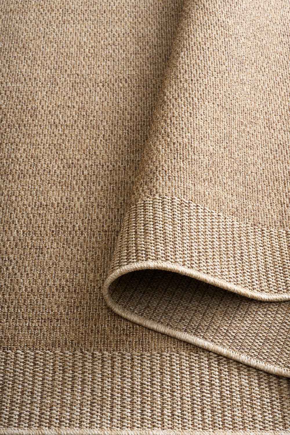 Linden Border Natural indoor outdoor rug with a neutral centre and contrasting framed edge. Available at Rugs N Timber Belrose