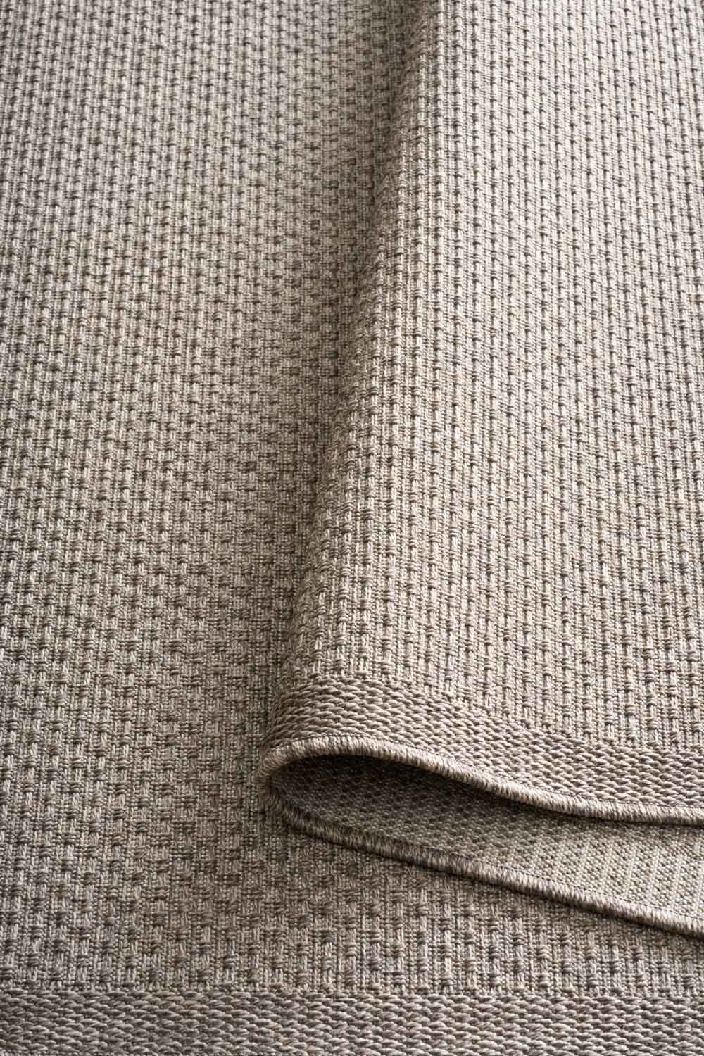 Linden Weave Stone indoor outdoor rug with a subtle warm taupe-grey woven pattern.  Available at Rugs N Timber Belrose