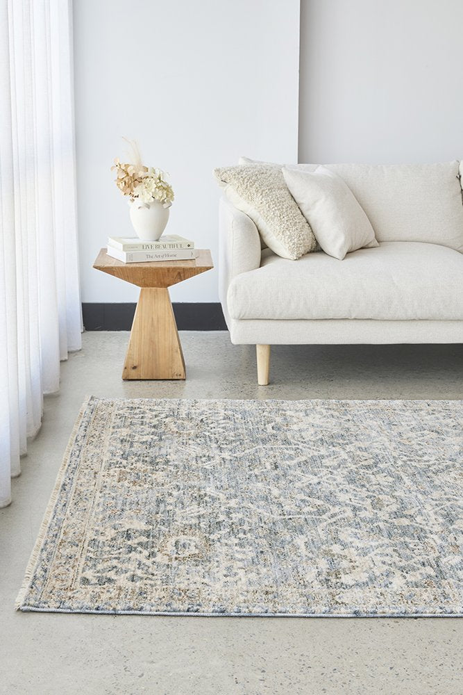 Margot Mist rug in soft blue and neutral tones with a vintage distressed finish, available at Rugs N Timber Belrose.
