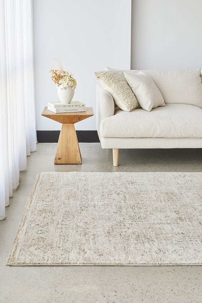 Margot Sandstone rug in soft natural beige with a distressed vintage look, available at Rugs N Timber Belrose.