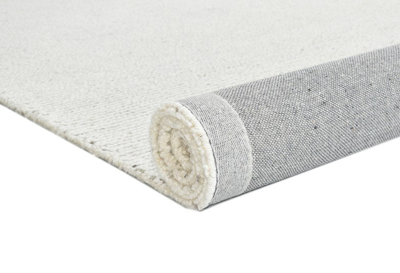 The Mosman Sand Rug is constructed using the finest wool fibres in a loop woven style. Visit us in our Belrose store.