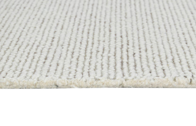 The Mosman Sand Rug is constructed using the finest wool fibres in a loop woven style. Visit us in our Belrose store.