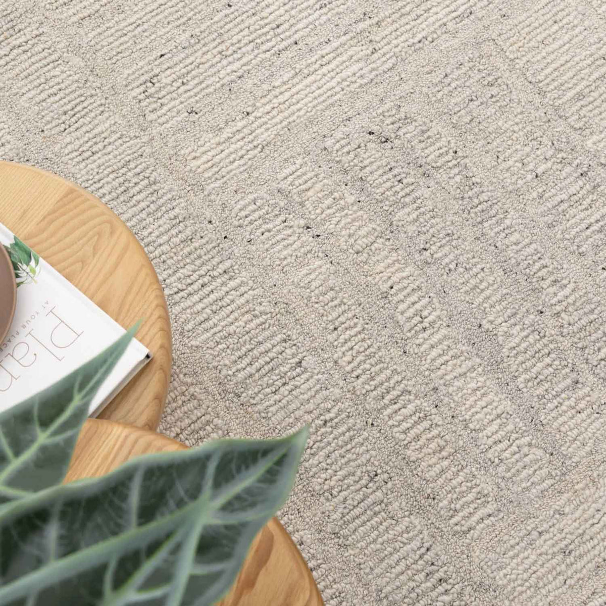 Nebraska Frost light silver wool rug featuring modern boucle weave, available at Rugs N Timber Belrose.