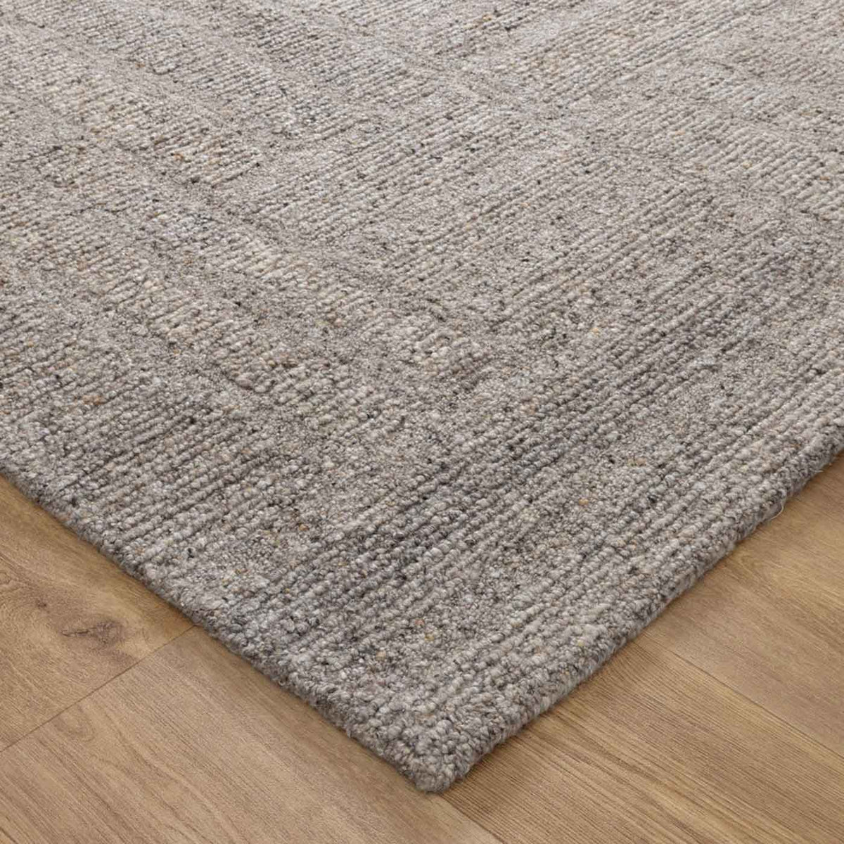Nebraska Timber wool rug with boucle texture in warm brown-grey tones, available at Rugs N Timber Belrose showroom.