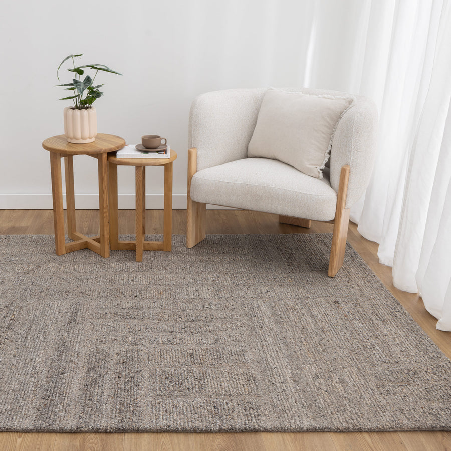 Nebraska Timber wool rug with boucle texture in warm brown-grey tones, available at Rugs N Timber Belrose showroom.