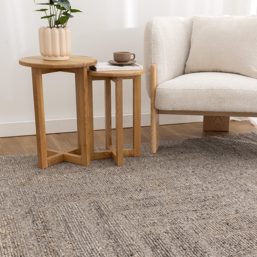 Nebraska Timber wool rug with boucle texture in warm brown-grey tones, available at Rugs N Timber Belrose showroom.